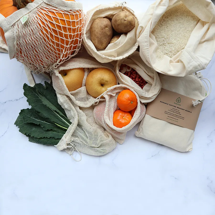 Multi-pocket Tote Bag made from organic cotton, featuring six pockets for secure grocery storage.