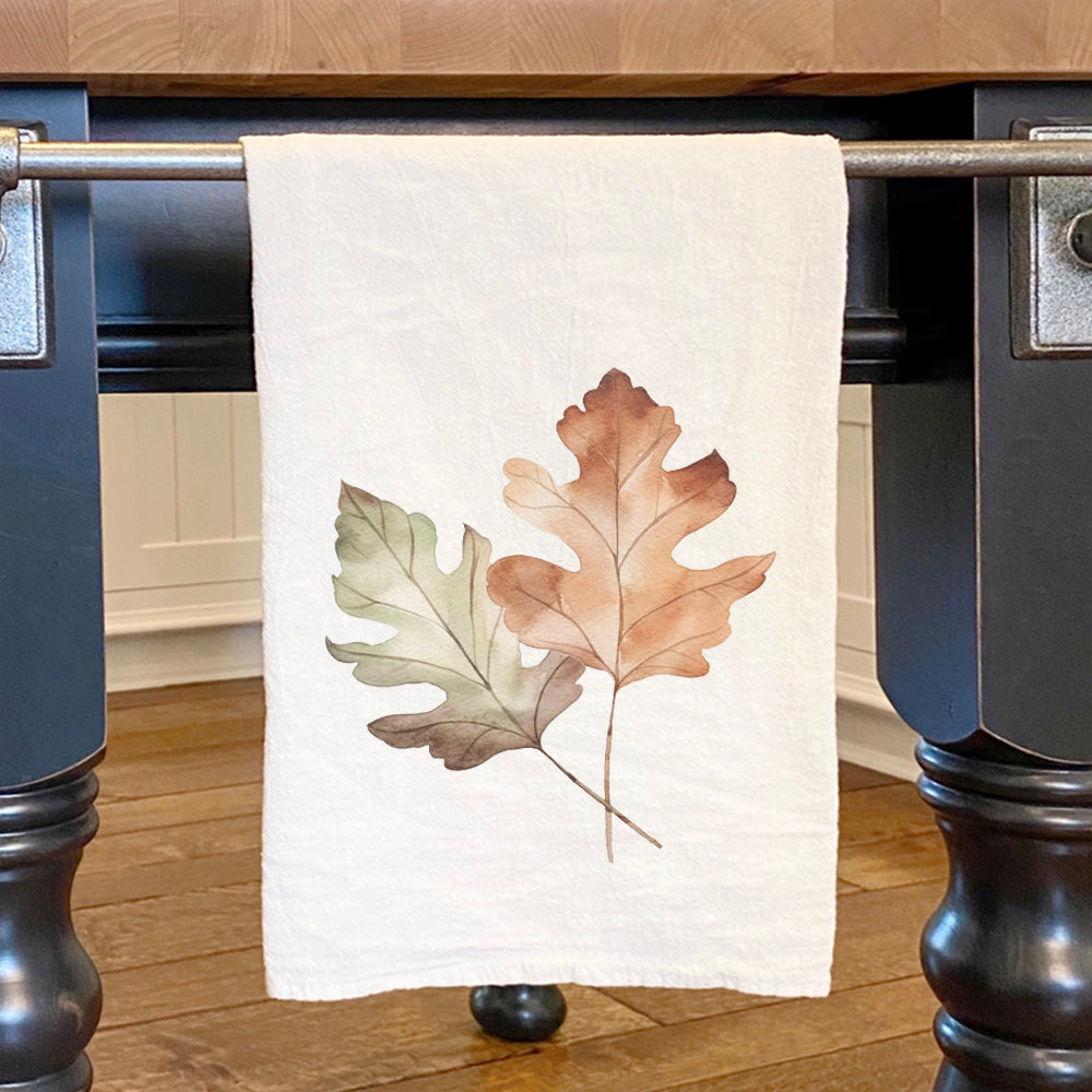 Oak Leaves Cotton Tea Towel featuring vibrant oak leaf design on absorbent fabric, perfect for kitchen use.