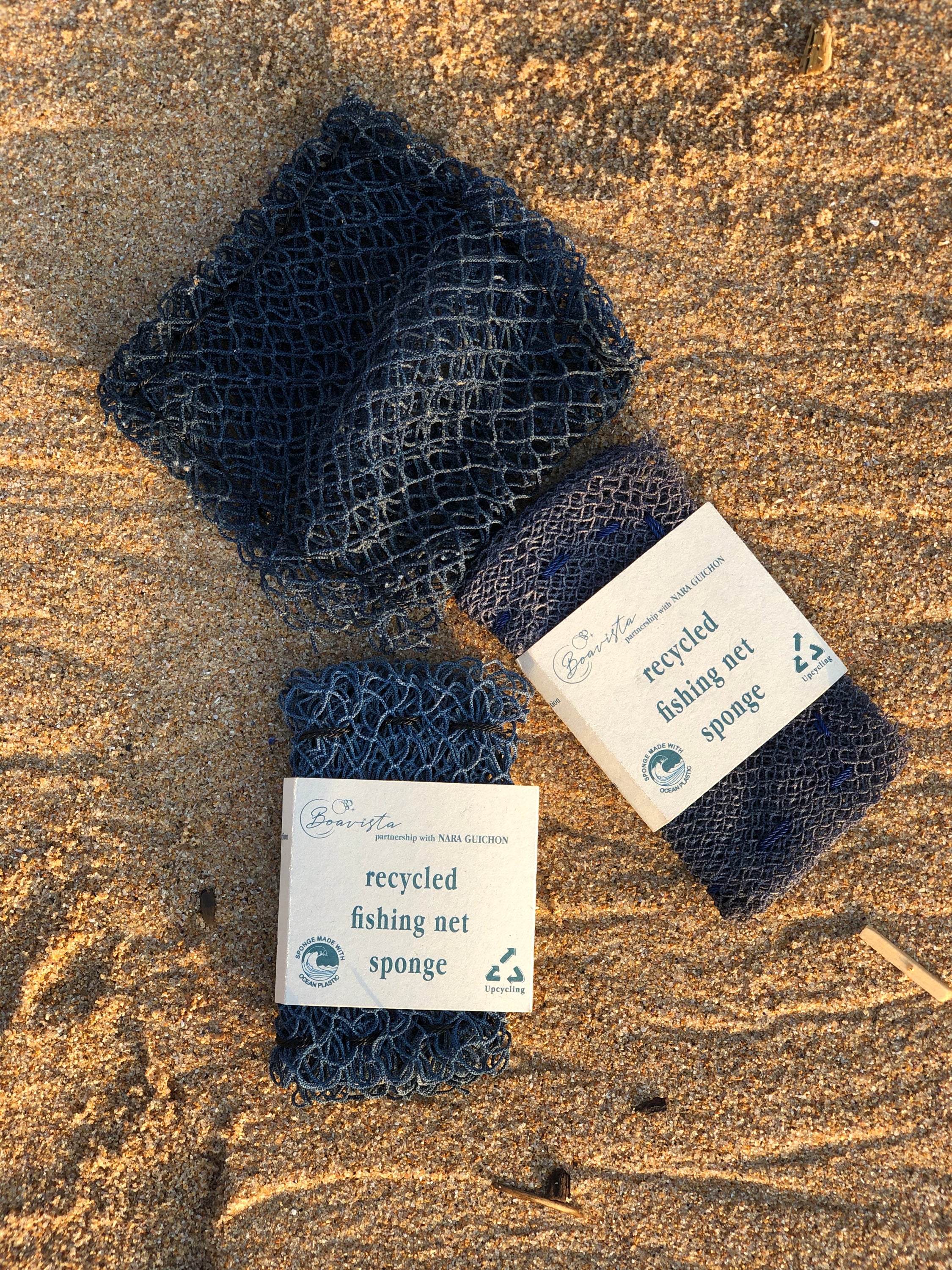 Ocean Saver Scrubber/Sponge made from recycled fishing nets, showcasing its unique texture and handcrafted design.