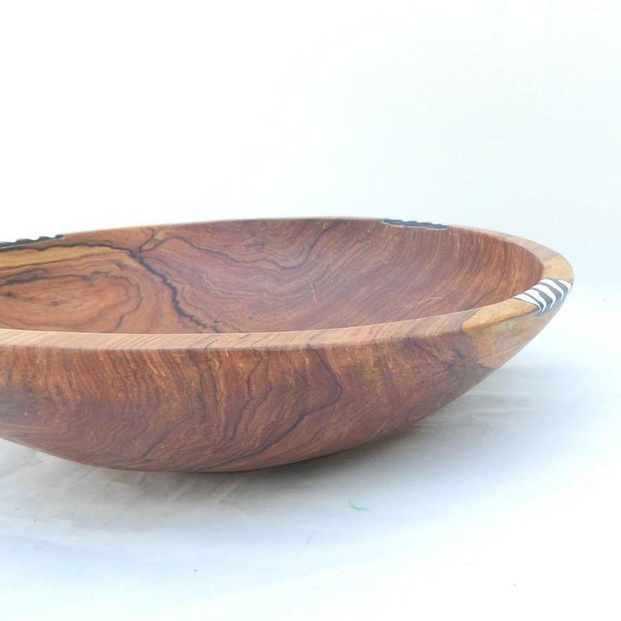 Handmade Olivewood Salad and Fruit Bowl with Cow Bone inlay, showcasing unique grain patterns and ethnic design.