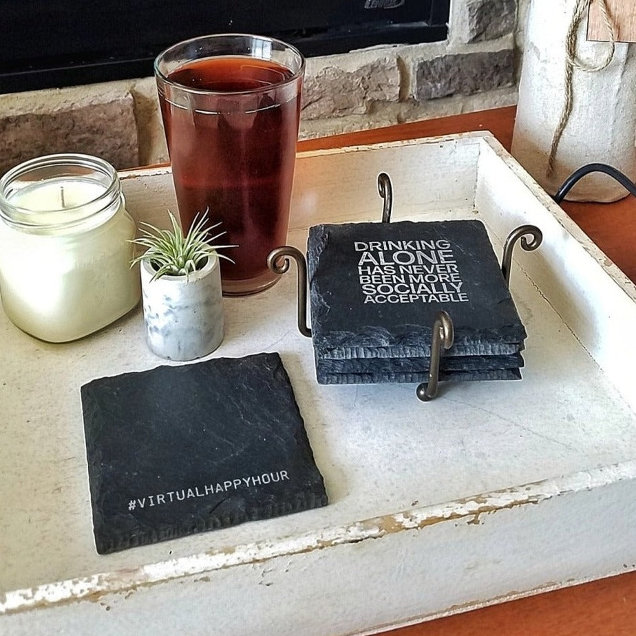 Premium artisan crafted slate coaster with leveled cork feet, perfect for protecting surfaces while enjoying drinks.