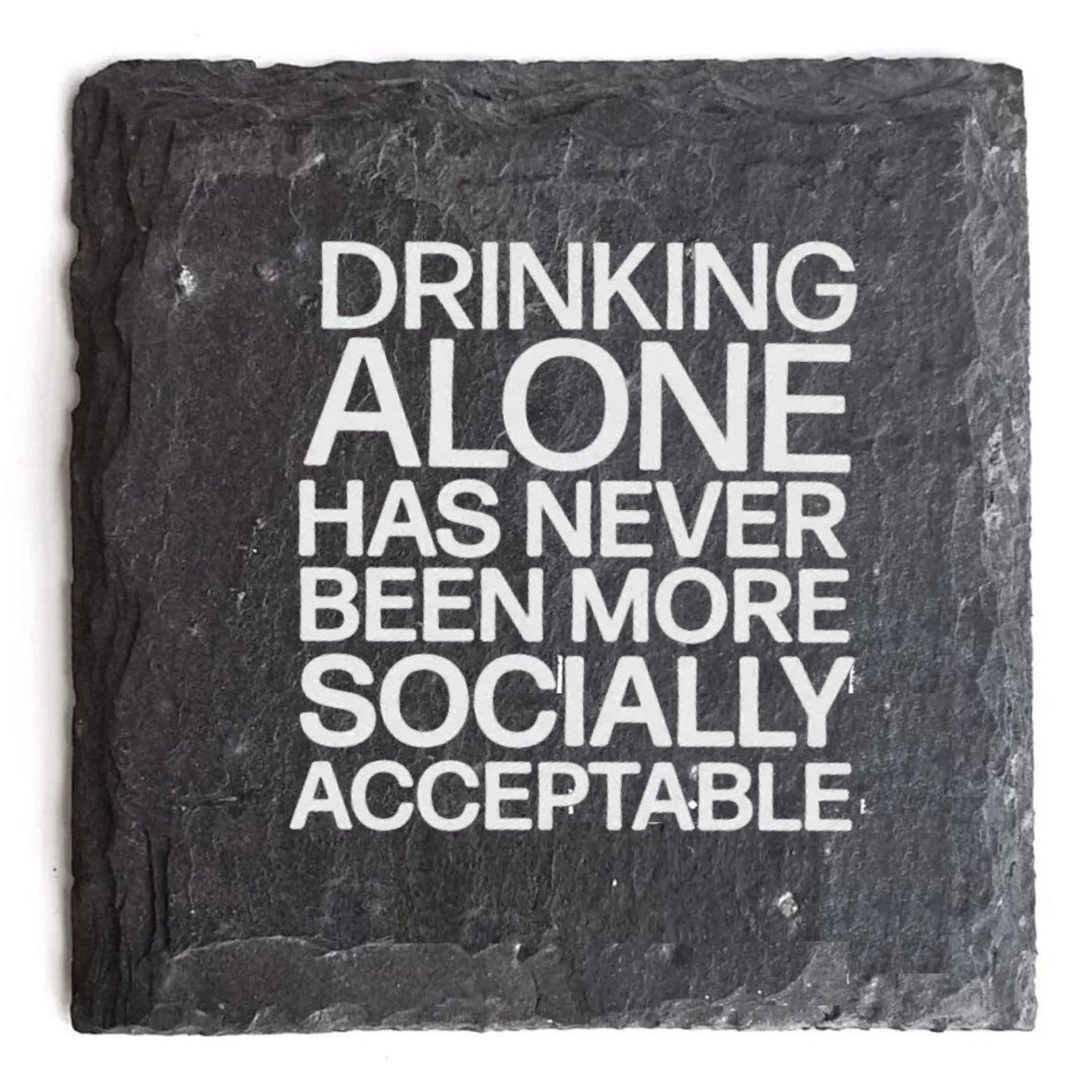 Premium artisan crafted slate coaster with leveled cork feet, perfect for protecting surfaces while enjoying drinks.