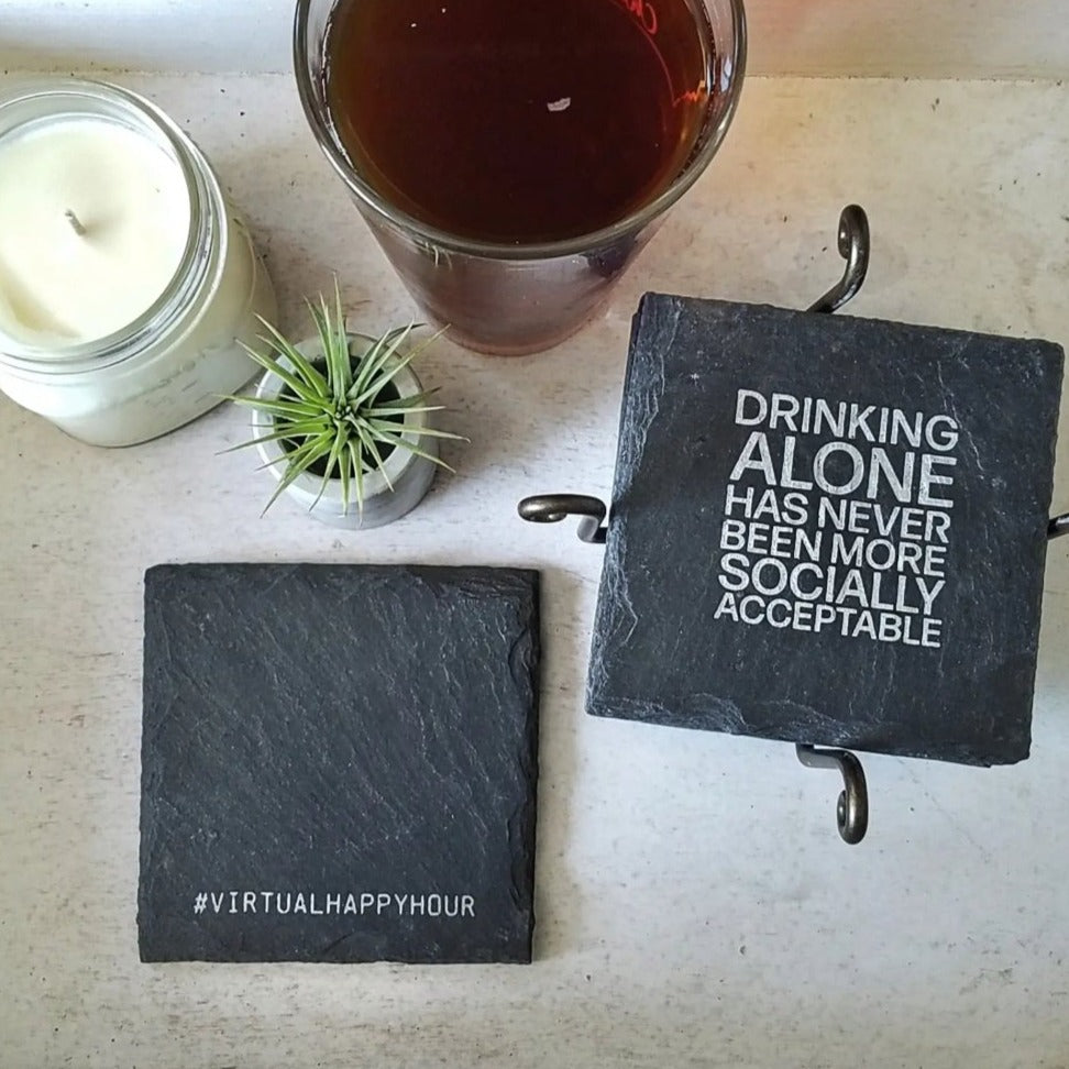 Premium artisan crafted slate coaster with leveled cork feet, perfect for protecting surfaces while enjoying drinks.