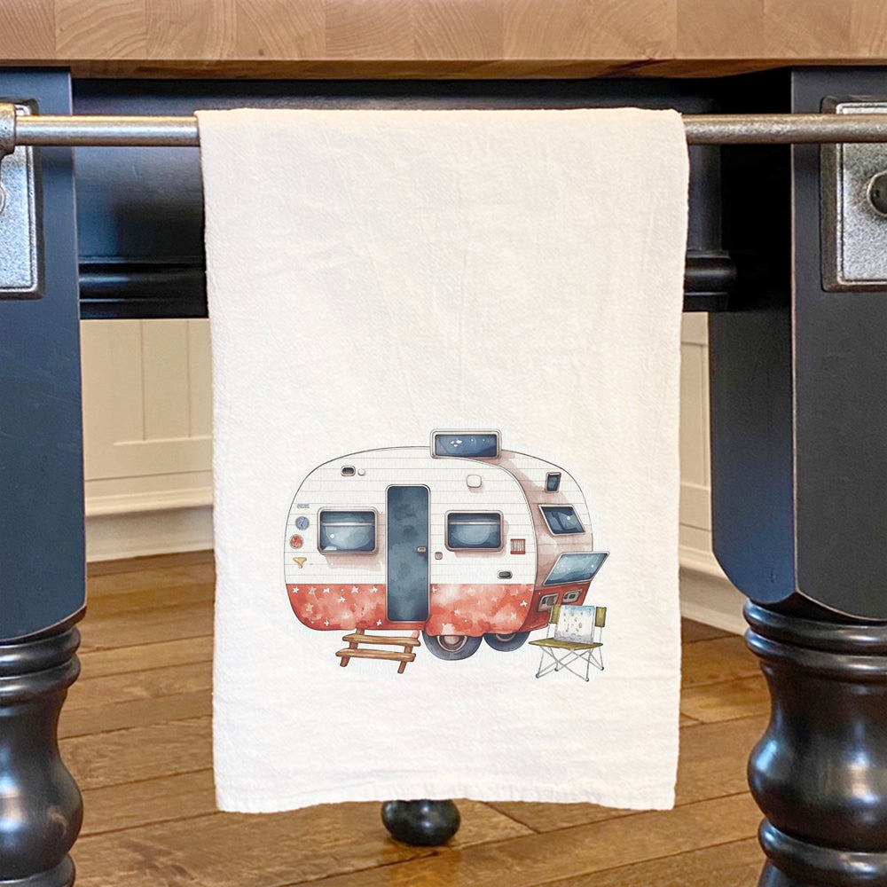 Patriotic Camper Cotton Tea Towel featuring vibrant designs, made from 100% organic cotton, displayed on a kitchen countertop.