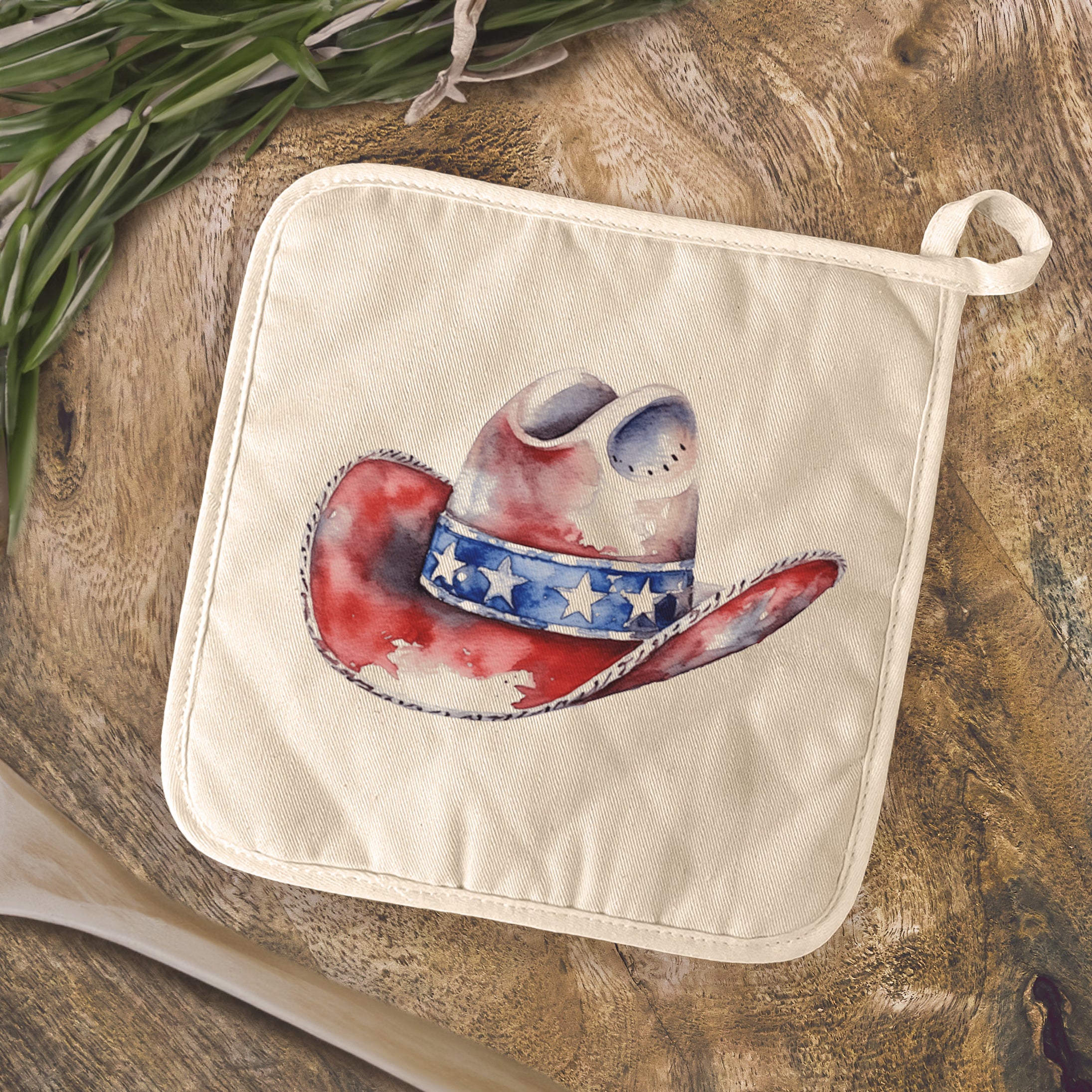 Patriotic Cowboy Hat Cotton Pot Holder featuring vibrant colors and a quilted design, perfect for kitchen use.