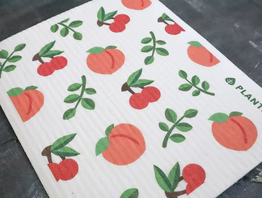 Peach Swedish Sponge Cloth with playful peach design, ideal for eco-friendly cleaning.