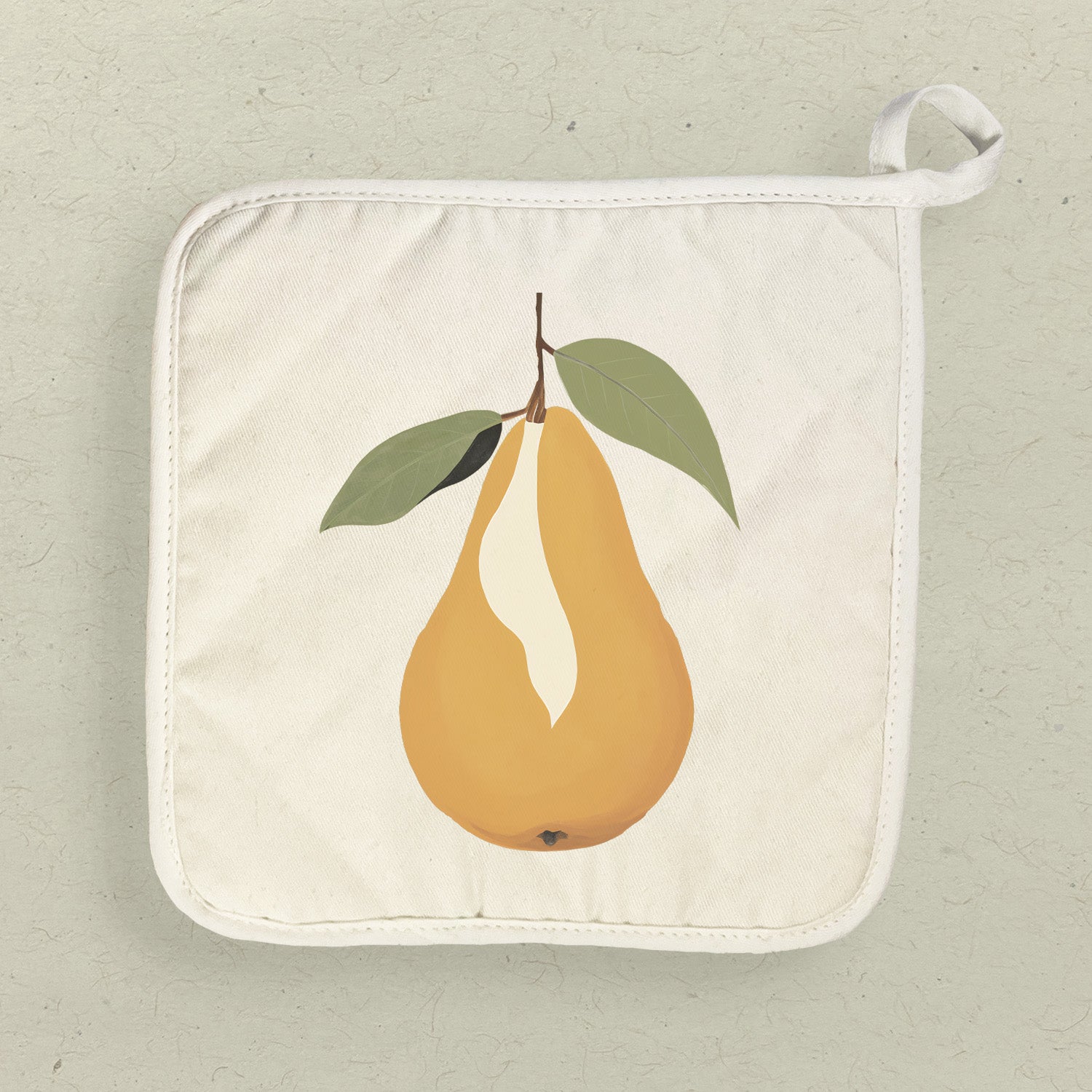 A vibrant Pear Cotton Pot Holder featuring a square shape, made from natural cotton and terry cloth, with a hanging loop for easy storage.