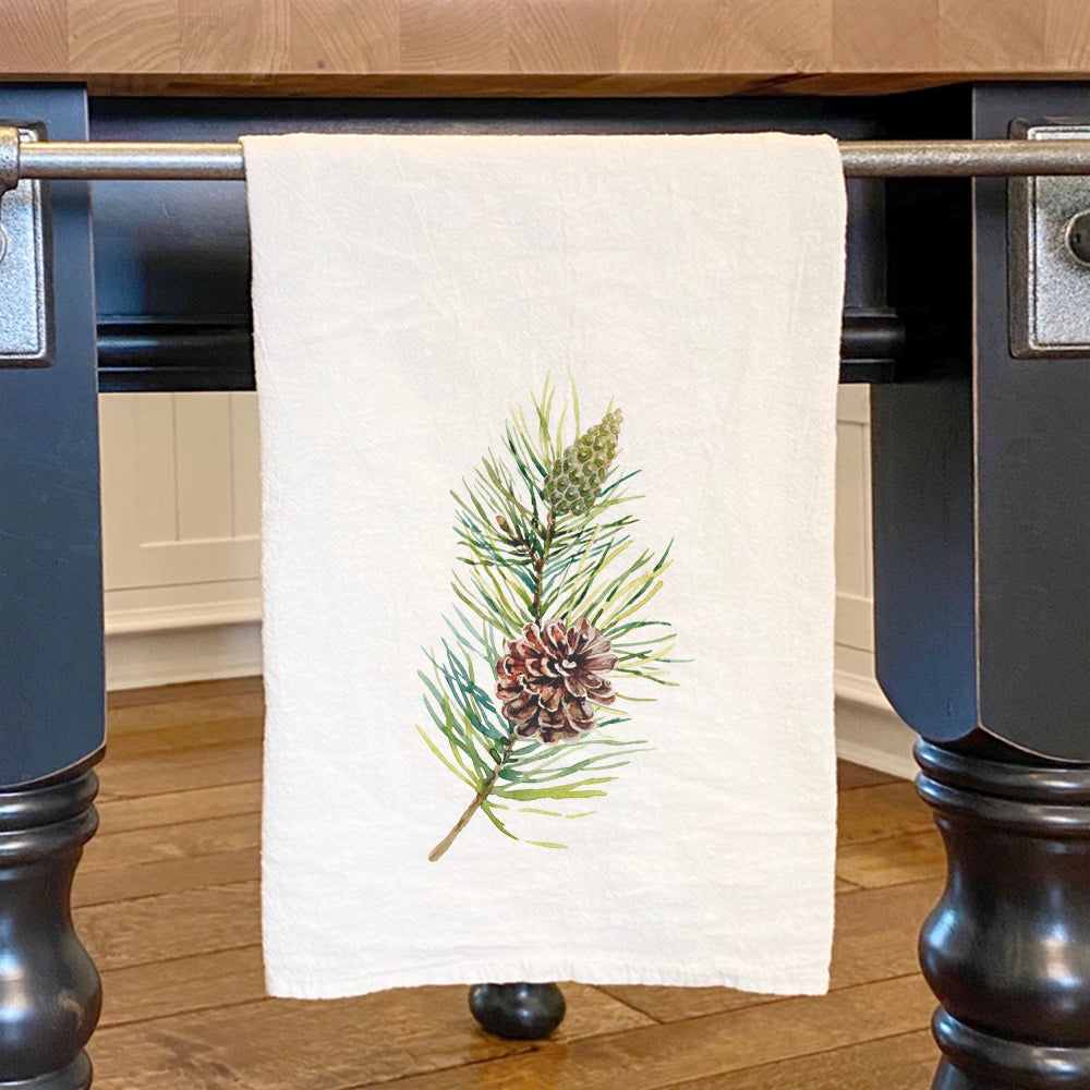 Pine Branch Cotton Tea Towel featuring a vibrant pine branch design on absorbent cotton fabric, perfect for kitchen use.