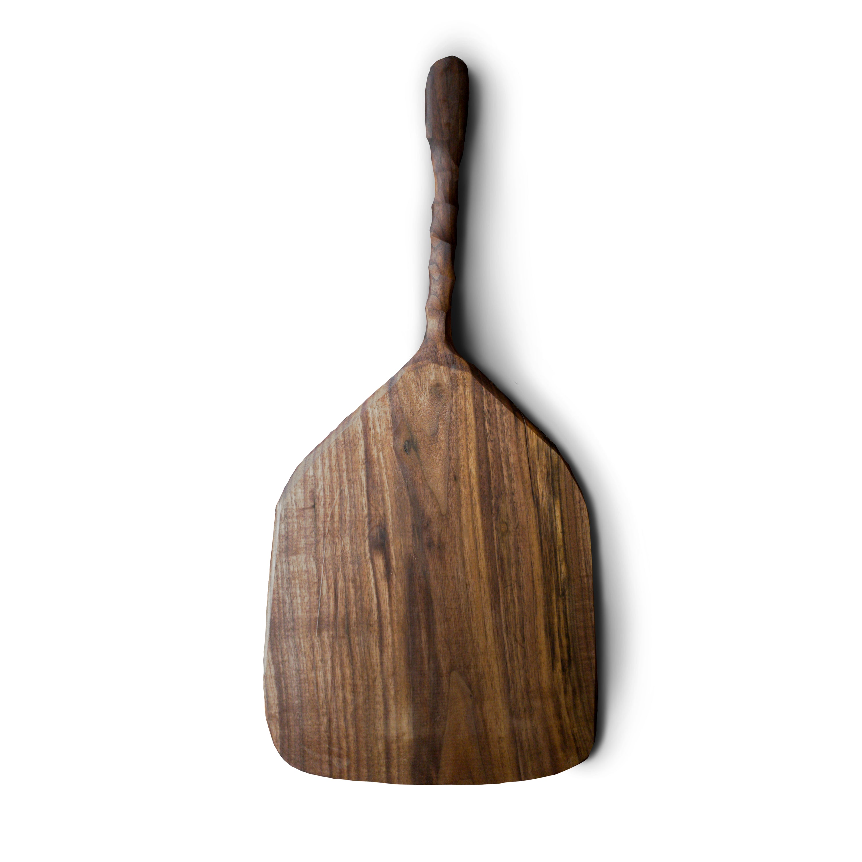 Wooden pizza paddle with handcarved chiseled handle, made from walnut lumber, showcasing its natural finish.