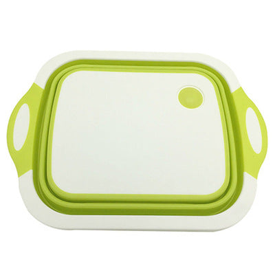 Plastic Multifunctional Folding Cutting Board with strainers, showcasing its ergonomic and space-saving design.