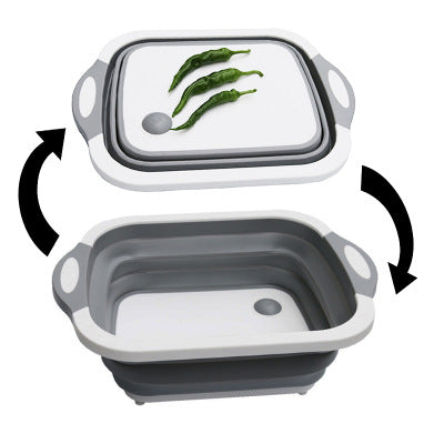 Plastic Multifunctional Folding Cutting Board with strainers, showcasing its ergonomic and space-saving design.