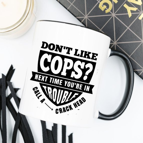 Funny Police Officer Mug with humorous text, perfect gift for law enforcement fans.