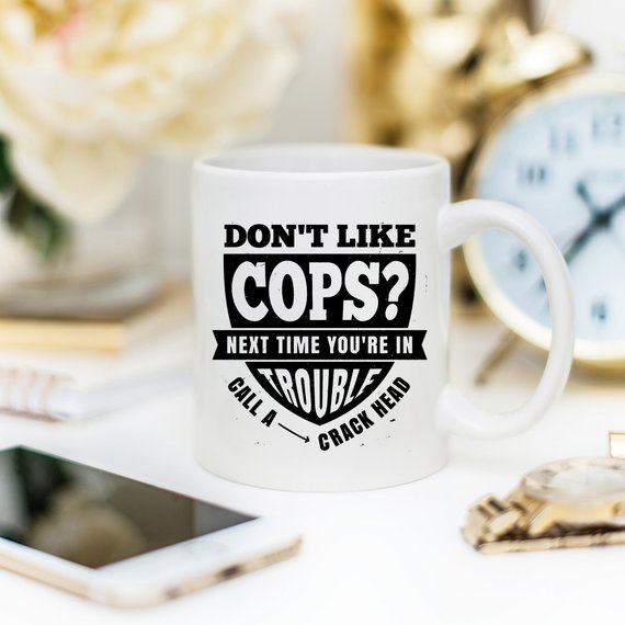 Funny Police Officer Mug with humorous text, perfect gift for law enforcement fans.