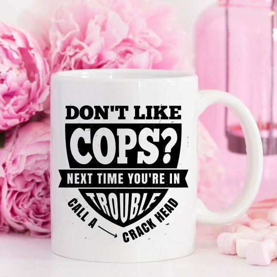 Funny Police Officer Mug with humorous text, perfect gift for law enforcement fans.