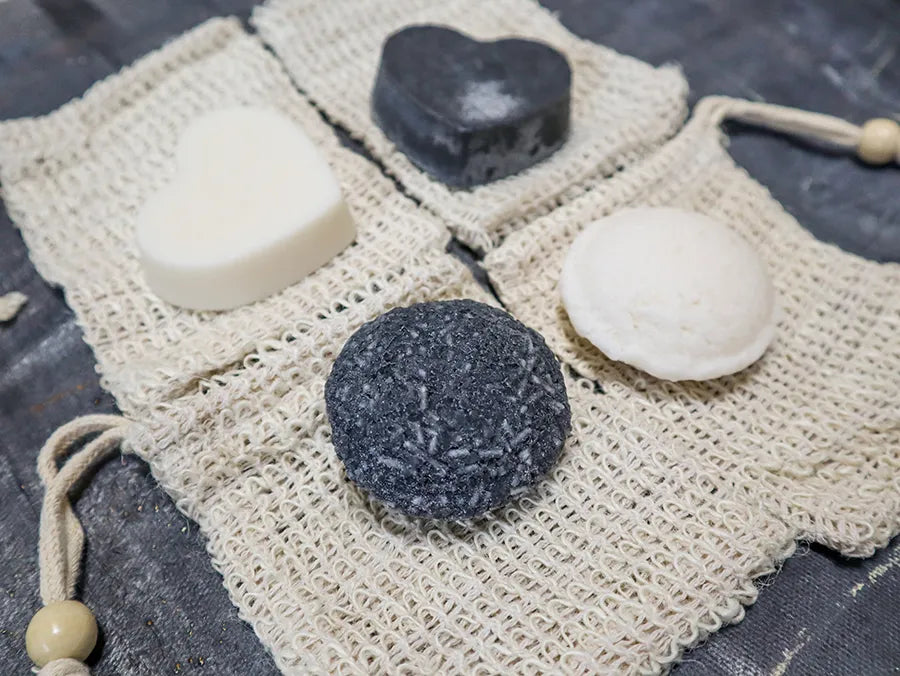 Rebalancing Shampoo and Conditioner Bar Set featuring eco-friendly, vegan ingredients for oily and fine hair types.