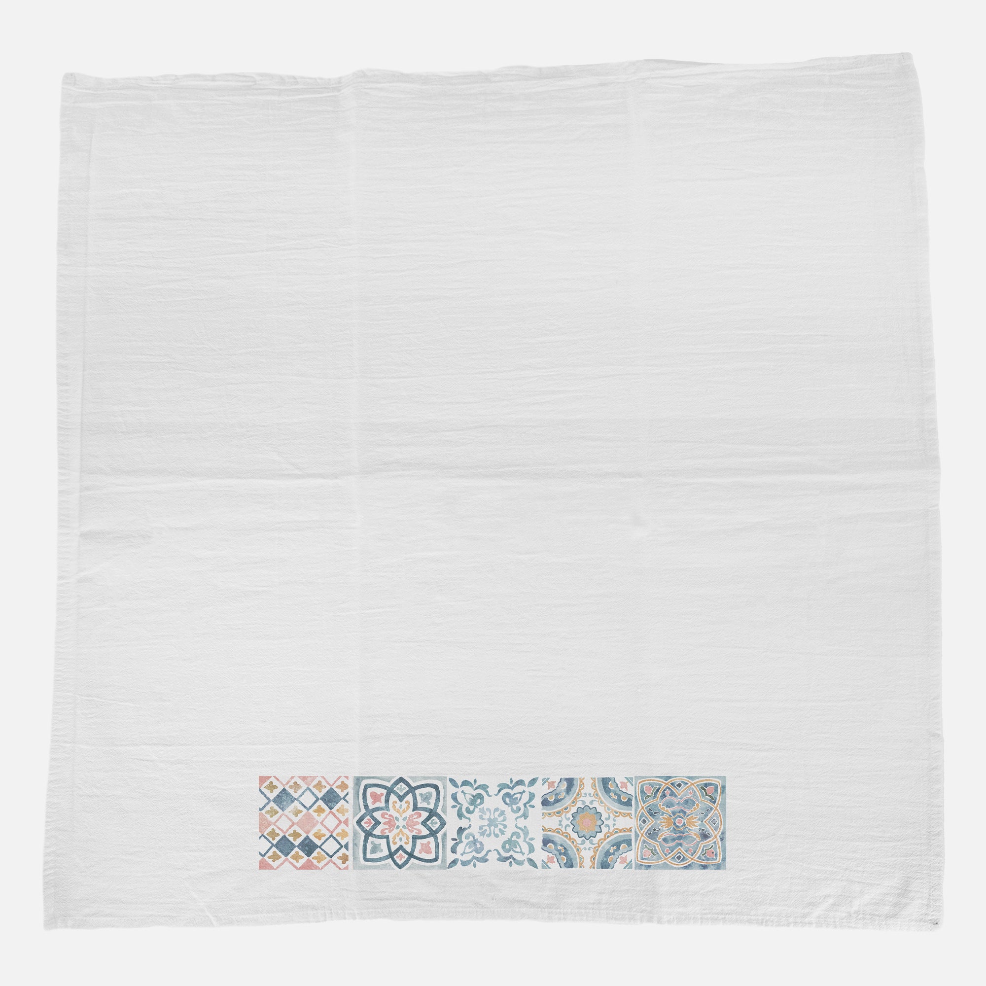 A vibrant cotton tea towel featuring a Row of Talavera Tiles Pattern, showcasing intricate tile designs in bright colors.