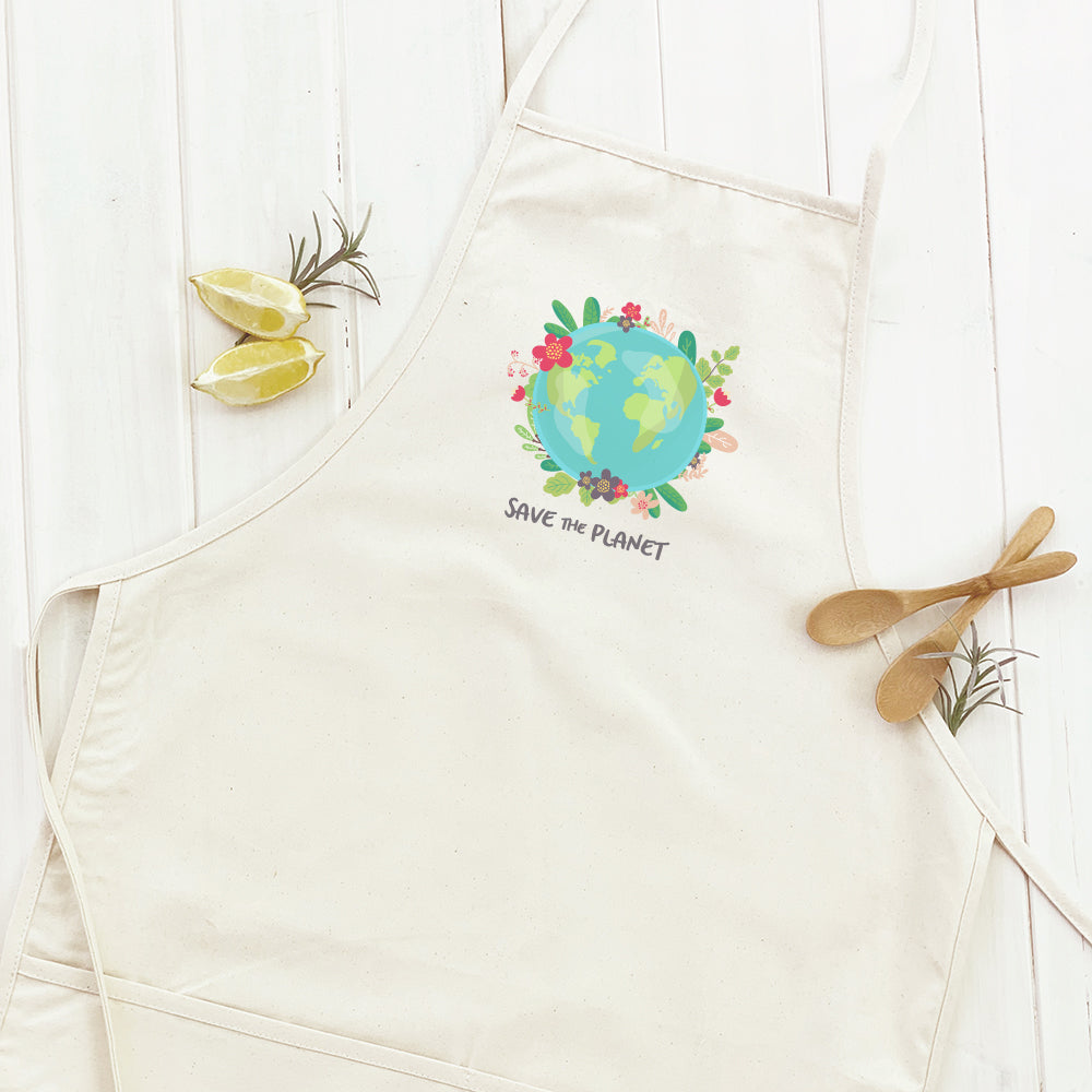 Save the Planet Women's Apron made from cotton canvas with natural twill ties and a divided front pocket, featuring eco-friendly water-based ink designs.