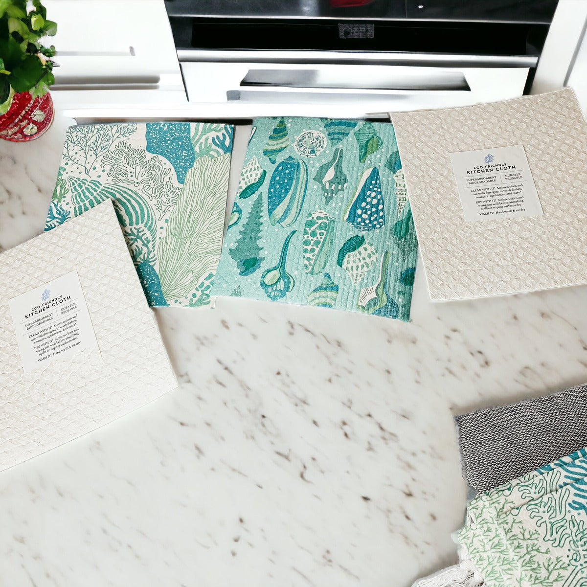 A stylish Sea Biodegradable Cloth featuring coastal designs, made from eco-friendly materials, perfect for kitchen and bathroom cleaning.