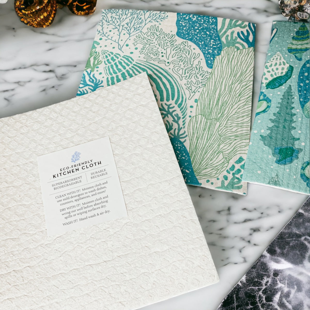 A stylish Sea Biodegradable Cloth featuring coastal designs, made from eco-friendly materials, perfect for kitchen and bathroom cleaning.