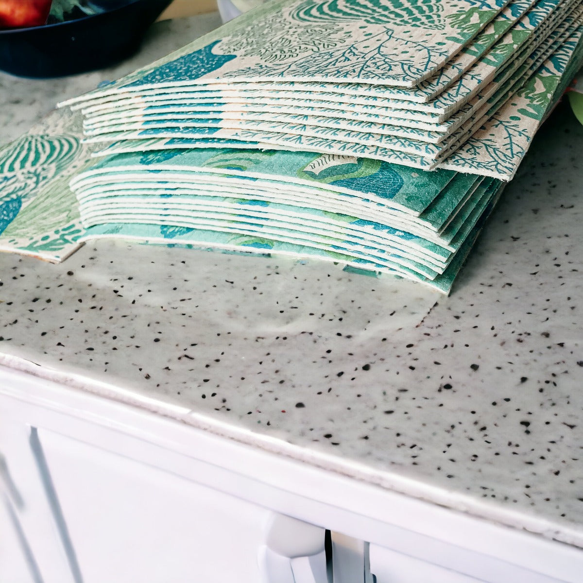 A stylish Sea Biodegradable Cloth featuring coastal designs, made from eco-friendly materials, perfect for kitchen and bathroom cleaning.