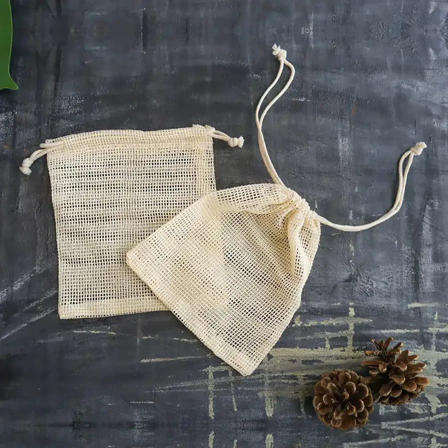 Set of 2 Organic Mesh Bags made from organic cotton, featuring a drawstring closure for secure storage.