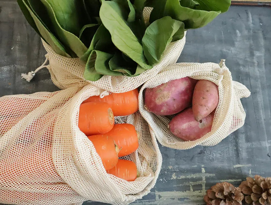 Set of 2 Organic Mesh Bags made from organic cotton, featuring a drawstring closure for secure storage.