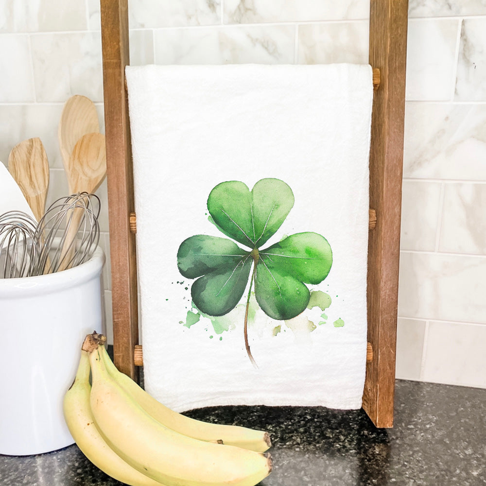 Shamrock Cotton Tea Towel featuring a vibrant shamrock design, made from 100% absorbent cotton, measuring 27 inches square.