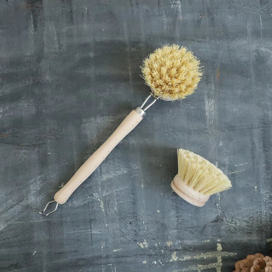 Sisal Dish Brush with a natural fiber head and ergonomic handle, ideal for eco-friendly kitchen cleaning.