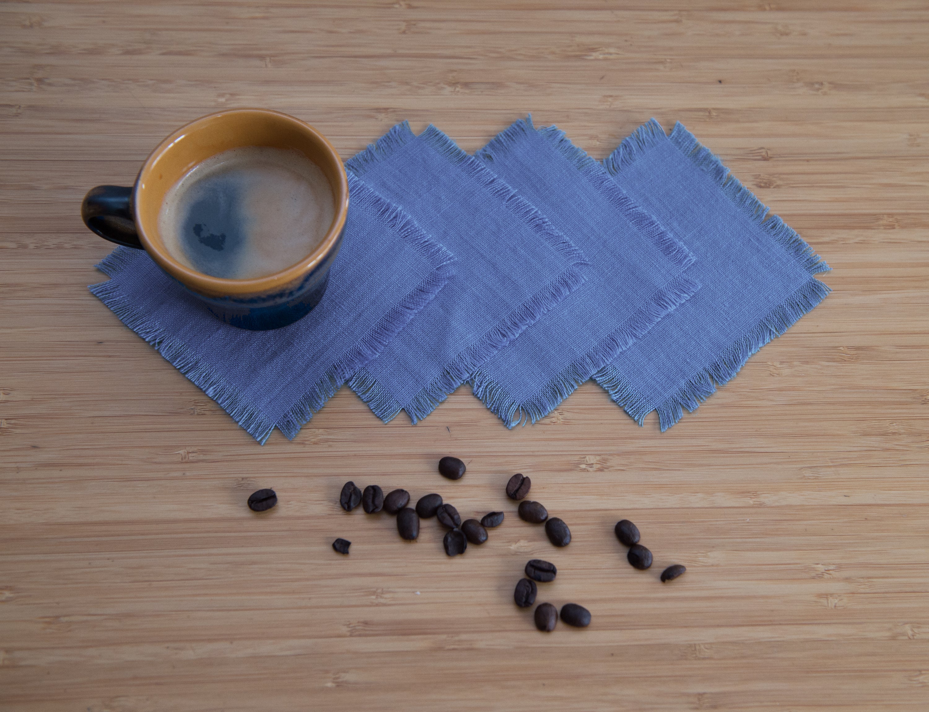 Sky Blue linen coasters set with tassels, showcasing elegant design and natural fabric.