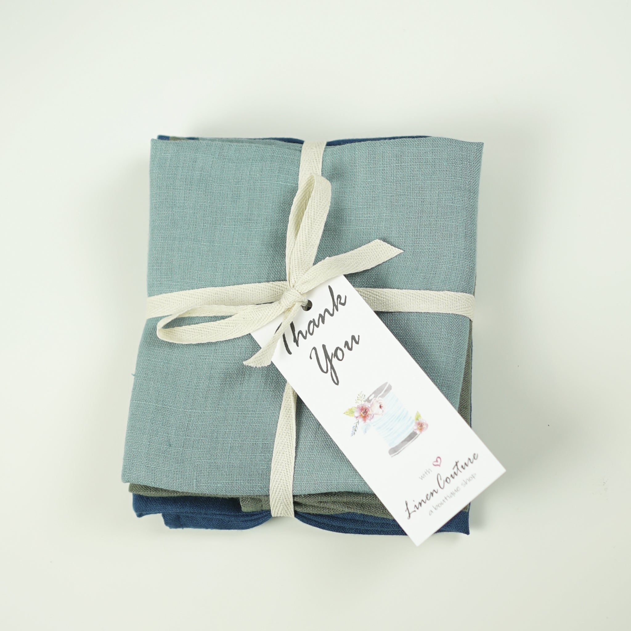 Sky Blue linen coasters set with tassels, showcasing elegant design and natural fabric.