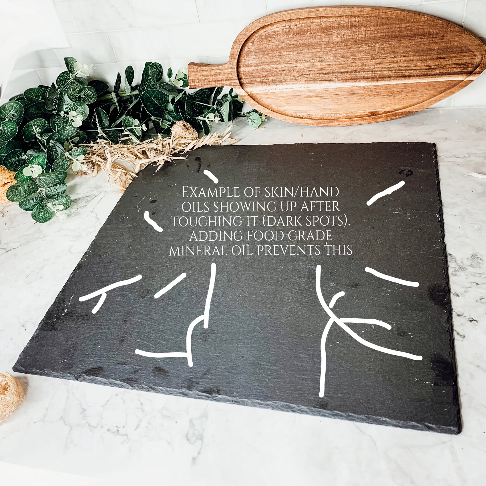 11-inch round slate cheese board with natural edges, perfect for serving appetizers and cheeses.