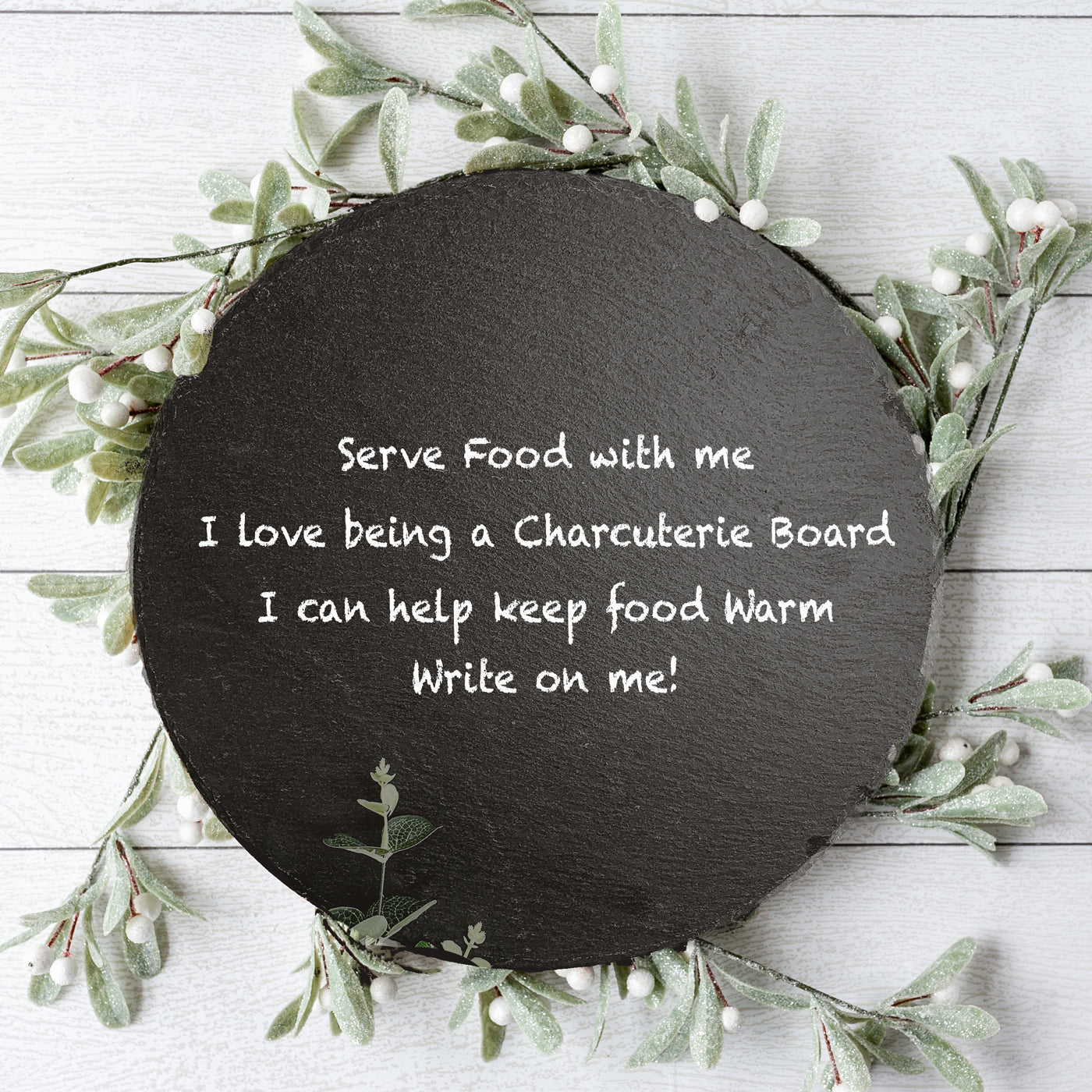 11-inch round slate cheese board with natural edges, perfect for serving appetizers and cheeses.