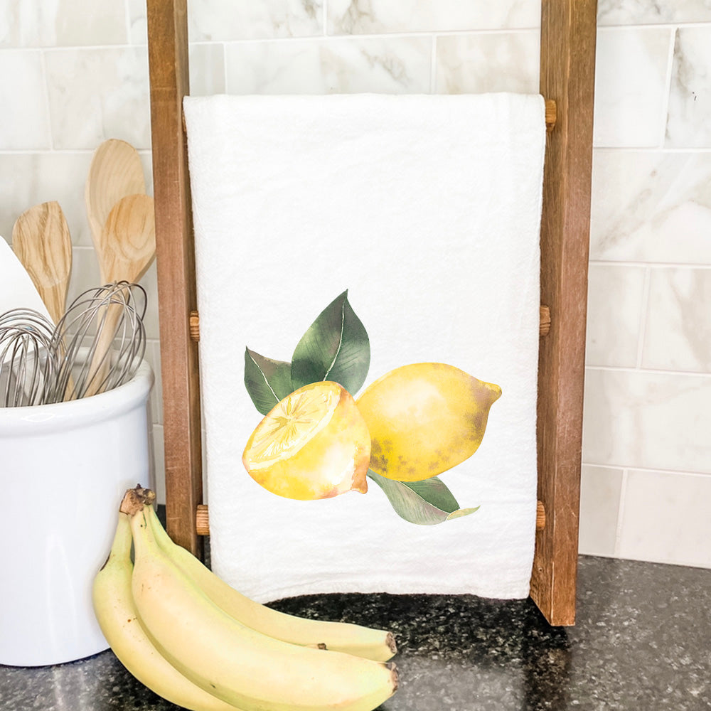 Sliced Lemon Cotton Tea Towel featuring vibrant lemon design on absorbent fabric, perfect for kitchen use.