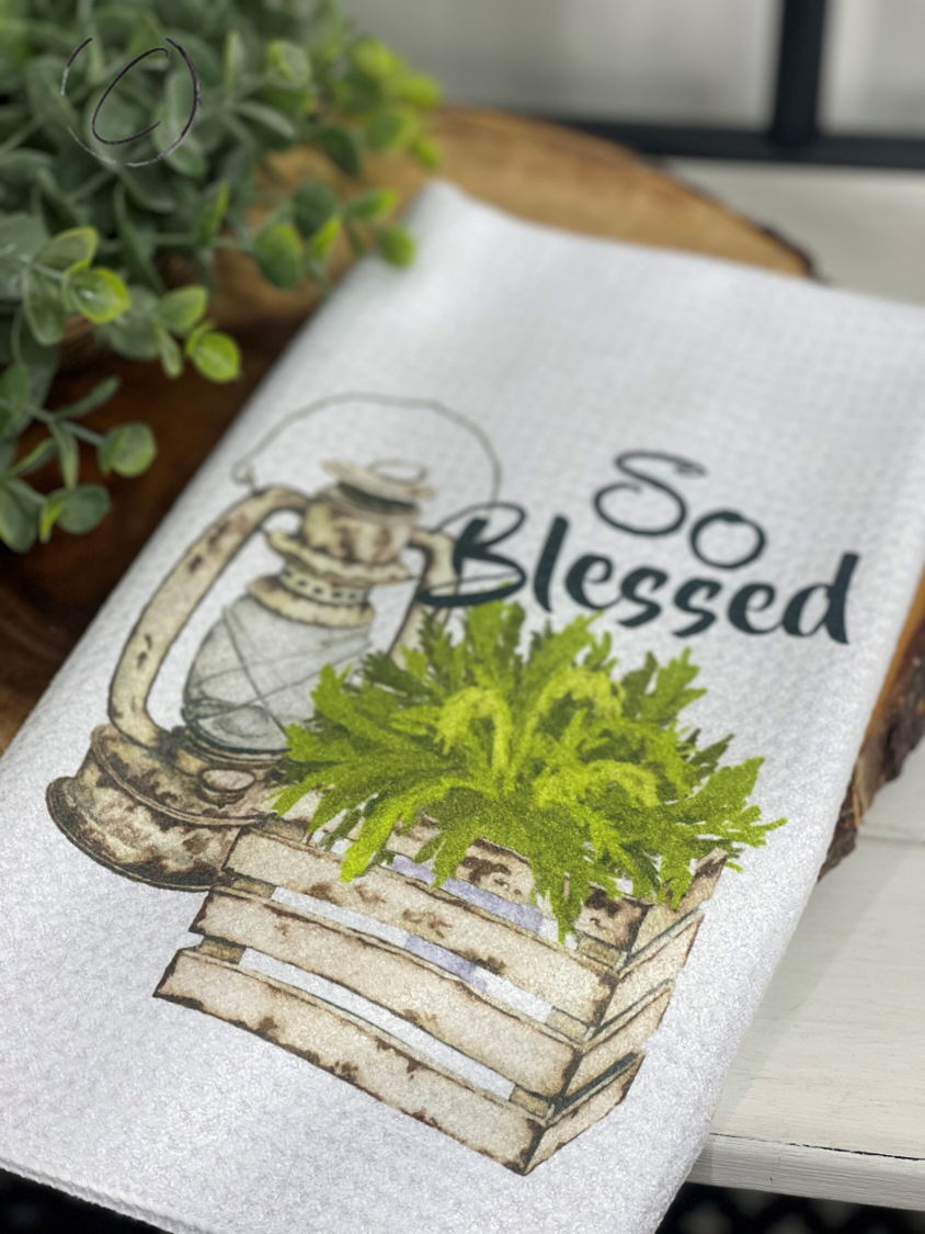 So Blessed Farmhouse Waffle Weave Tea Towel with a charming design, perfect for kitchen use.