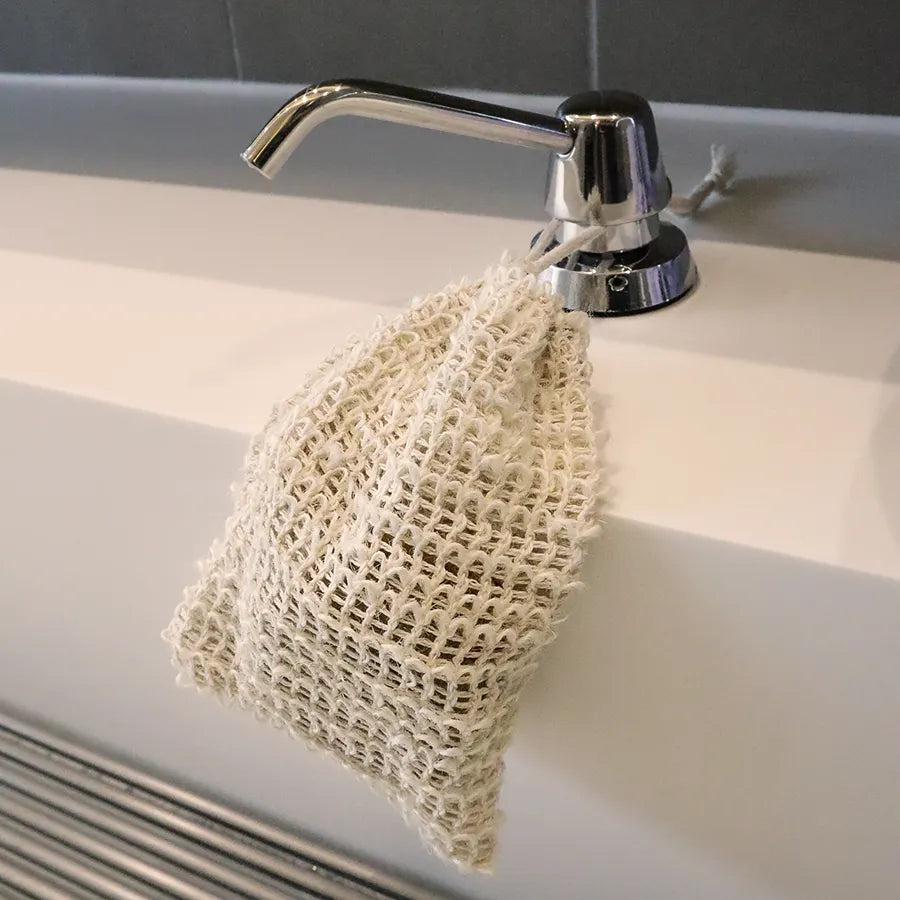 Natural sisal fiber soap bag designed for exfoliating and extending soap life, promoting a zero-waste lifestyle.