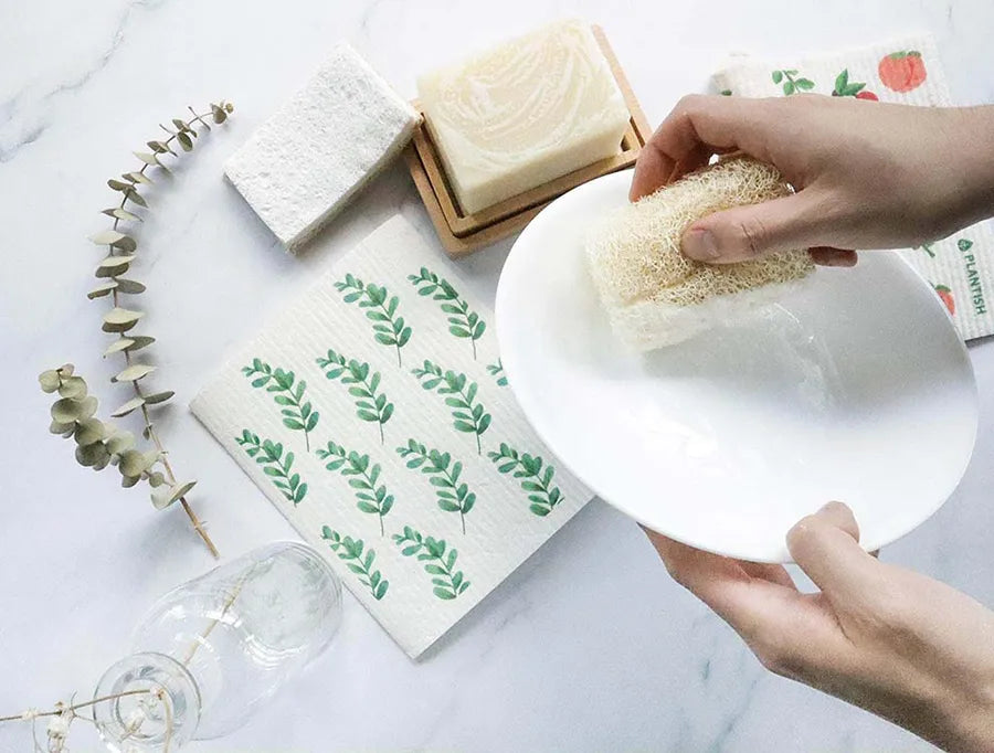 Eco-friendly Solid Dish Soap Bar displayed on a bamboo soap dish, showcasing its natural ingredients and sustainable packaging.