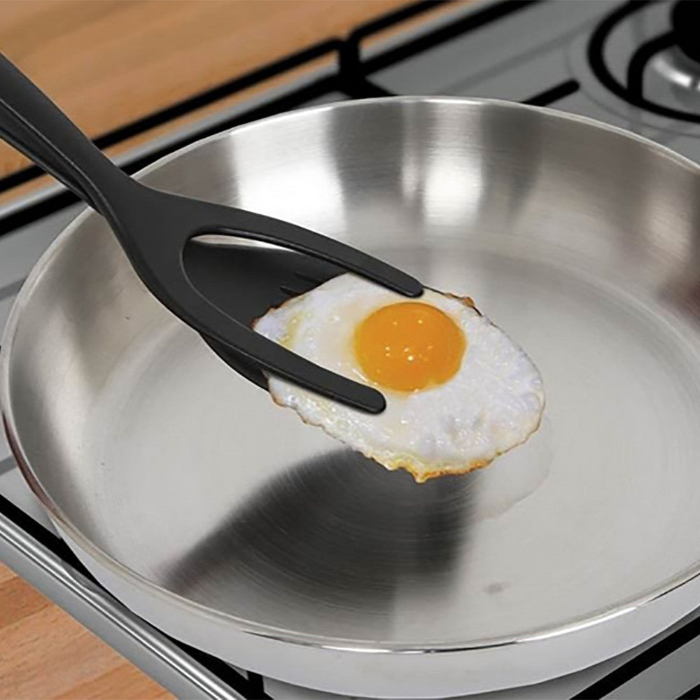 Spatula Tongs Cooking Tool made of silicone, featuring a scalloped tip for better grip, ideal for flipping eggs and other foods.