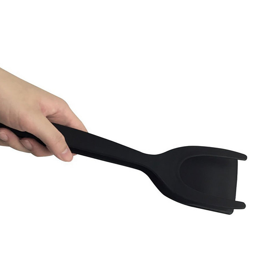 Spatula Tongs Cooking Tool made of silicone, featuring a scalloped tip for better grip, ideal for flipping eggs and other foods.