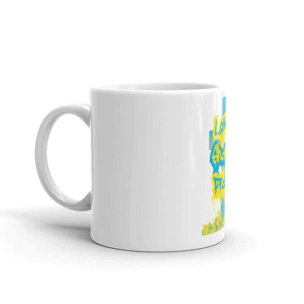 White glossy ceramic mug with a spray paint design featuring a cross, perfect for coffee or tea.