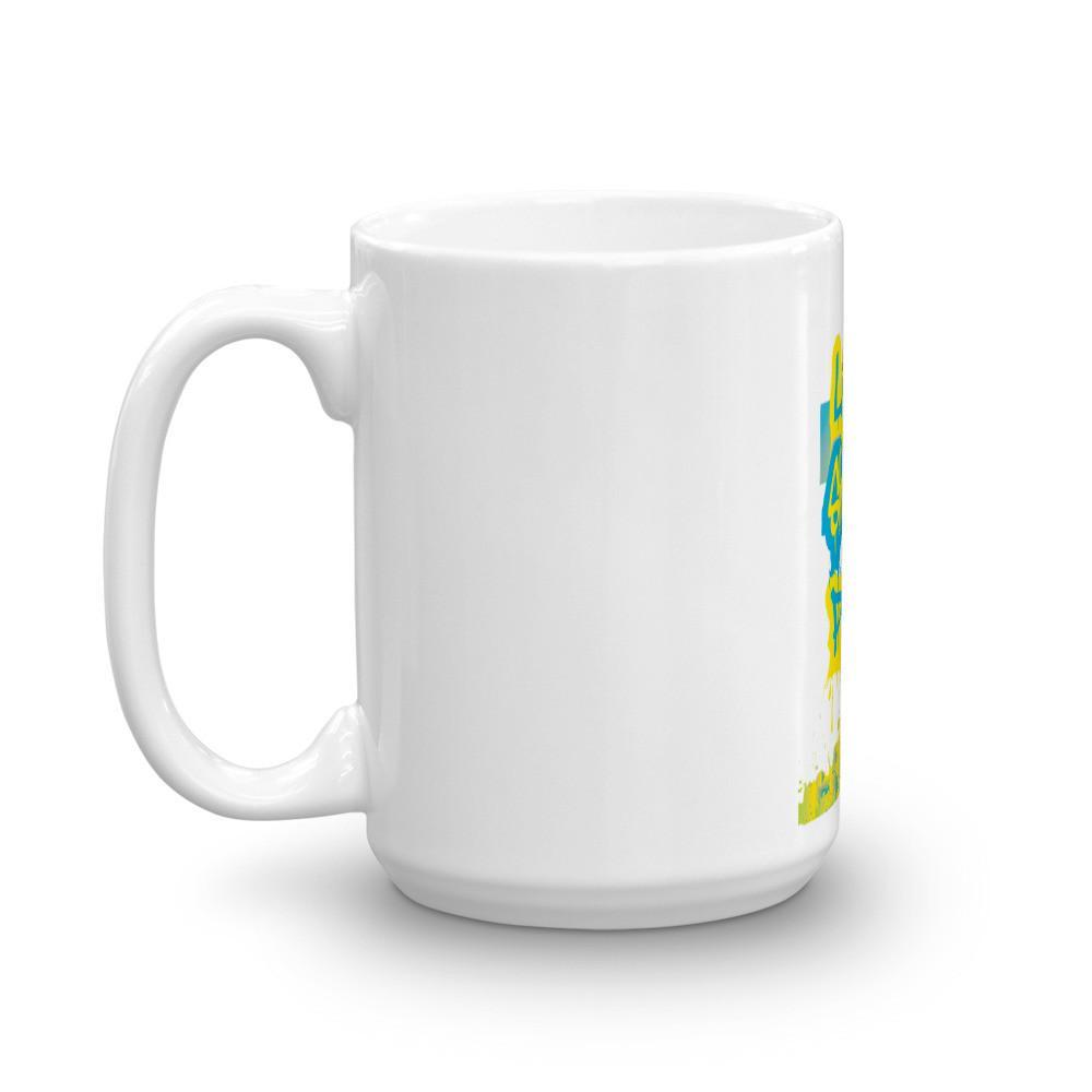 White glossy ceramic mug with a spray paint design featuring a cross, perfect for coffee or tea.