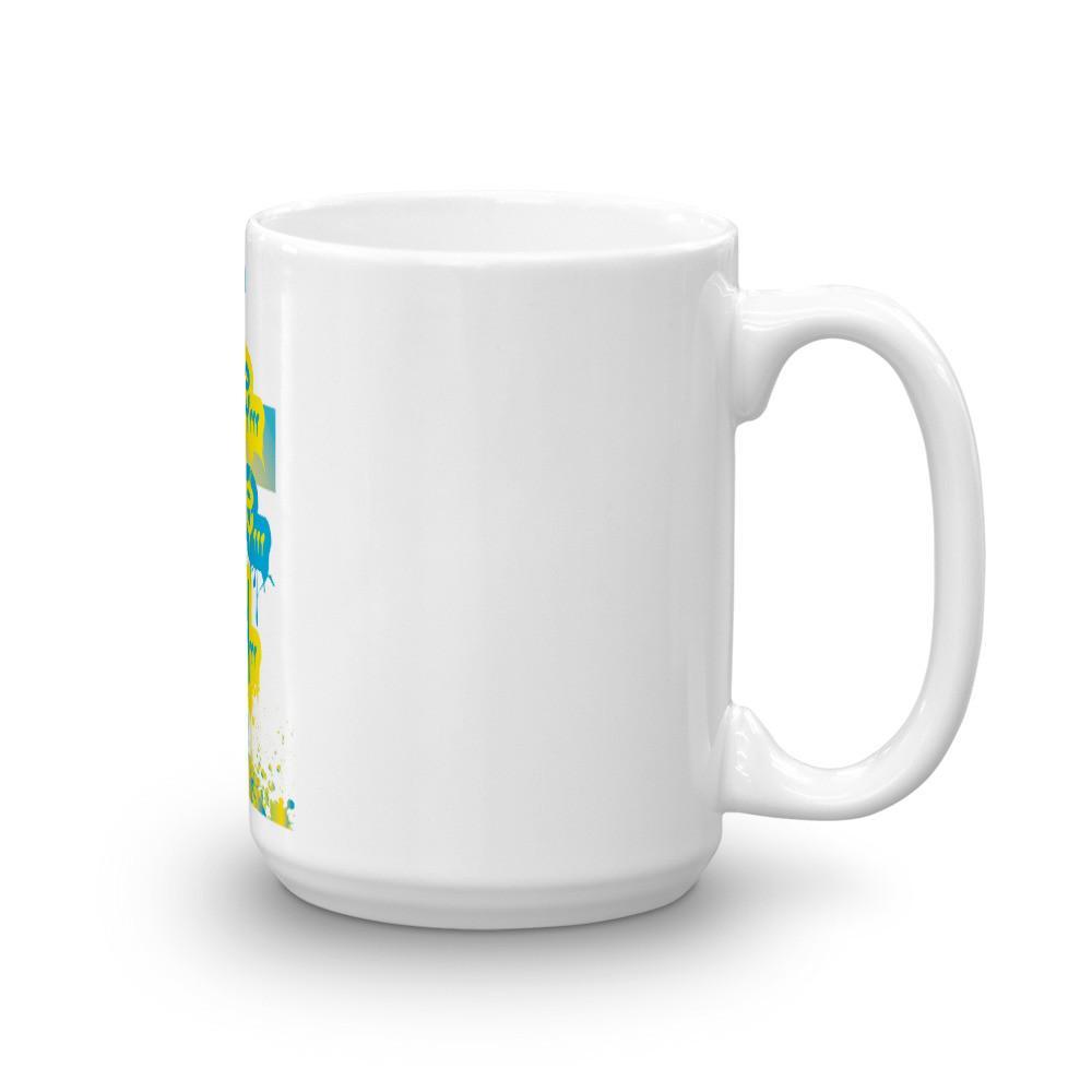 White glossy ceramic mug with a spray paint design featuring a cross, perfect for coffee or tea.