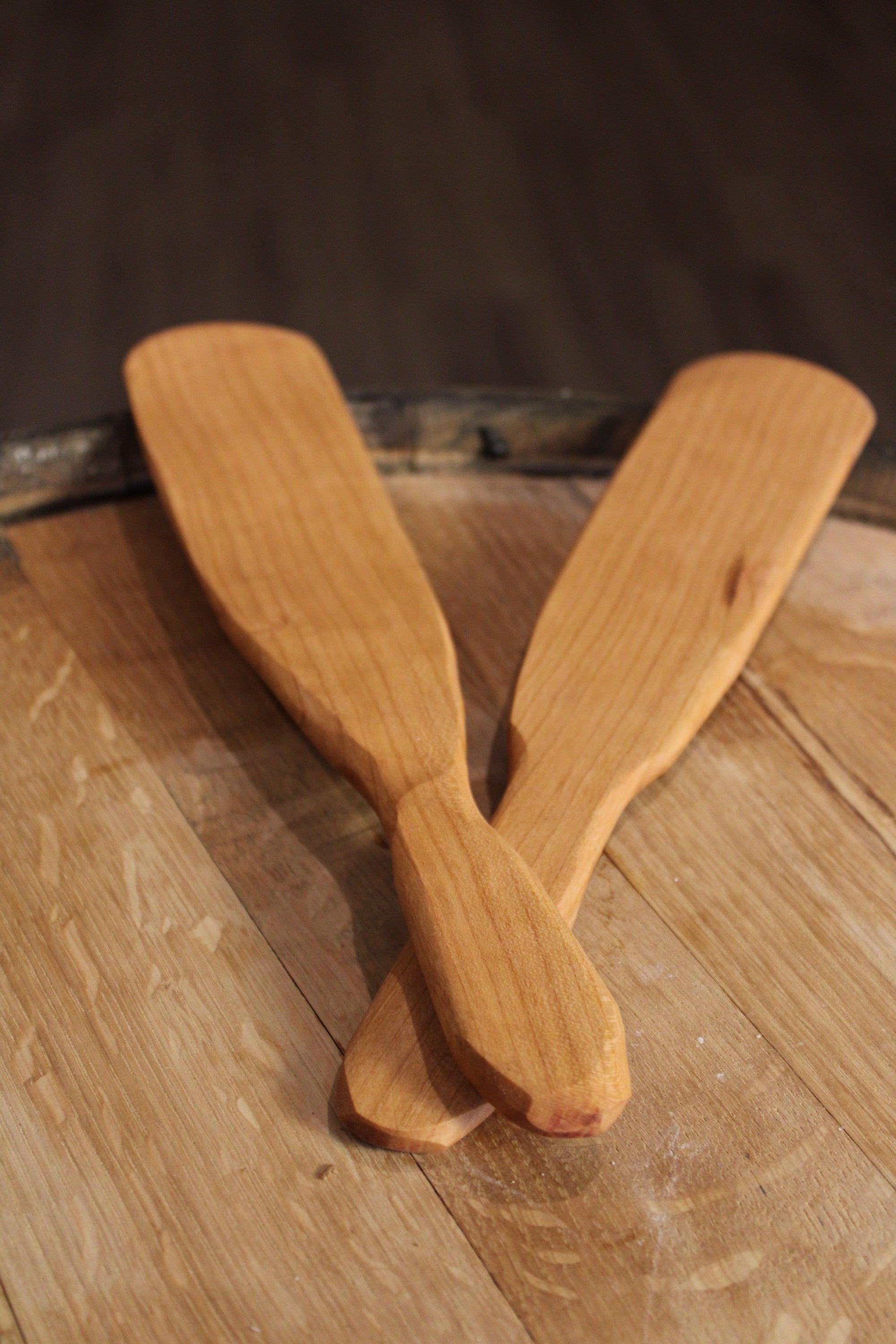 Spurtle Two Piece Set made of cherry hardwood, featuring a flat spurtle for flipping and a curved spurtle for stirring.