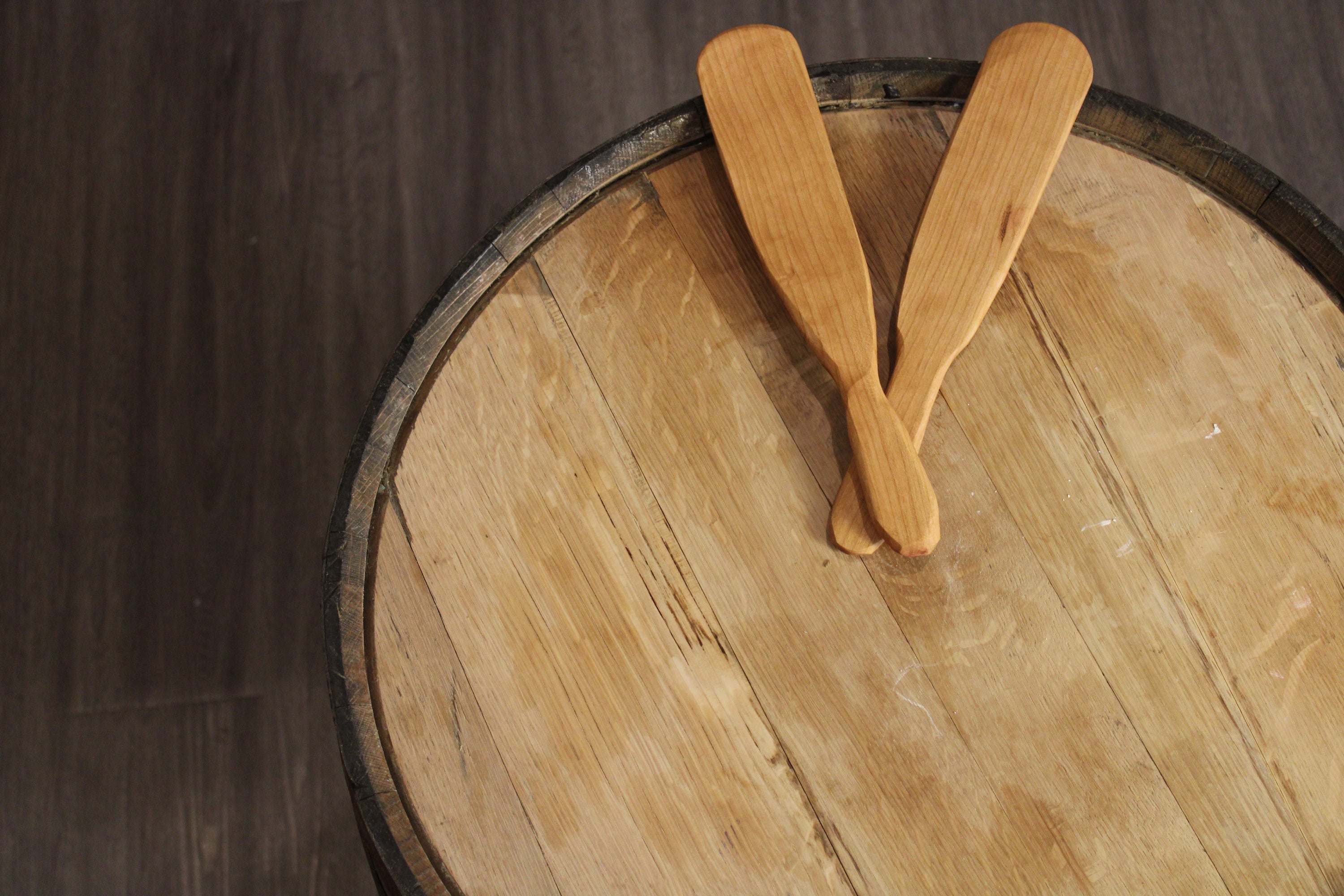 Spurtle Two Piece Set made of cherry hardwood, featuring a flat spurtle for flipping and a curved spurtle for stirring.