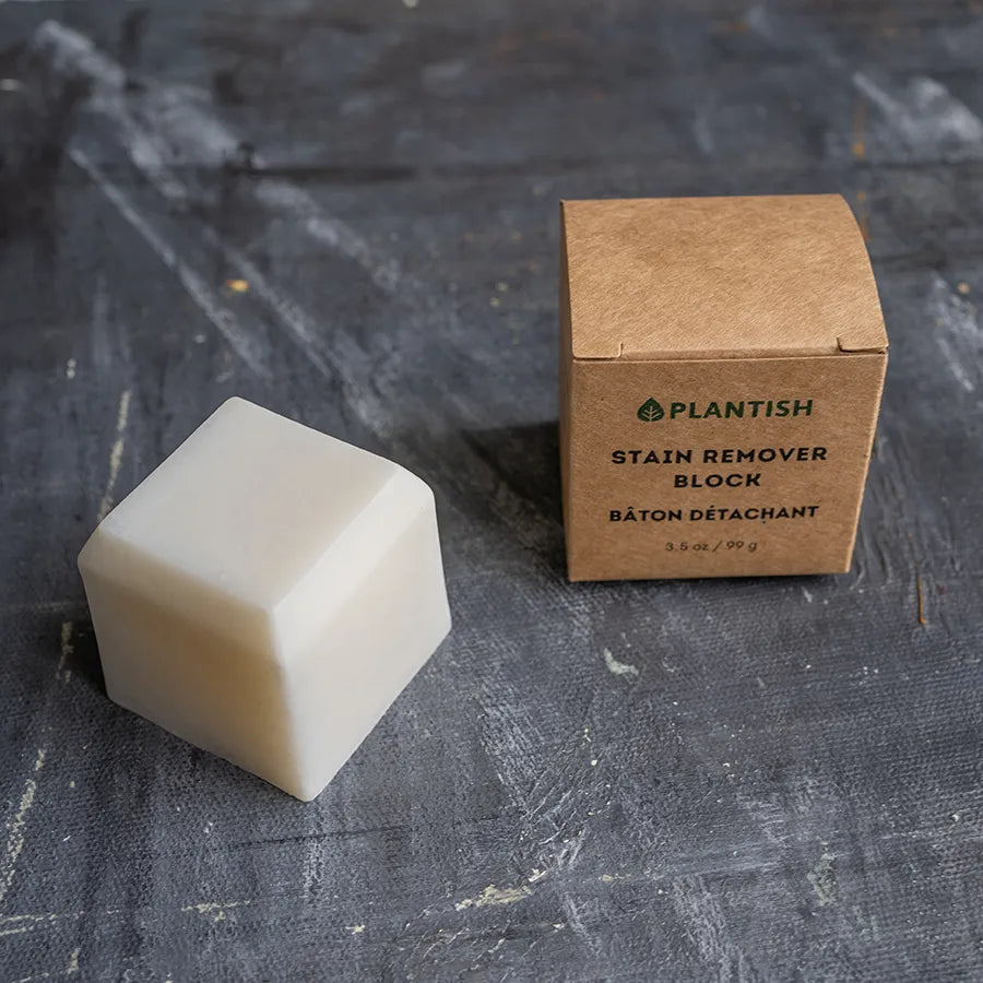 All-natural stain remover bar made from coconut oil and washing soda, effective on various stains and surfaces.