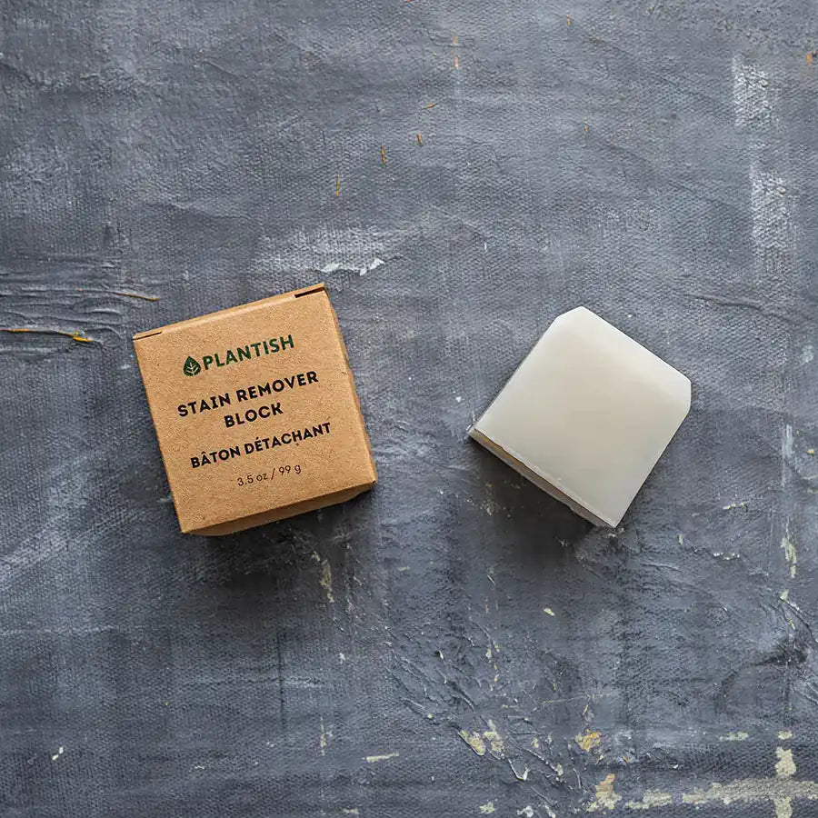 All-natural stain remover bar made from coconut oil and washing soda, effective on various stains and surfaces.