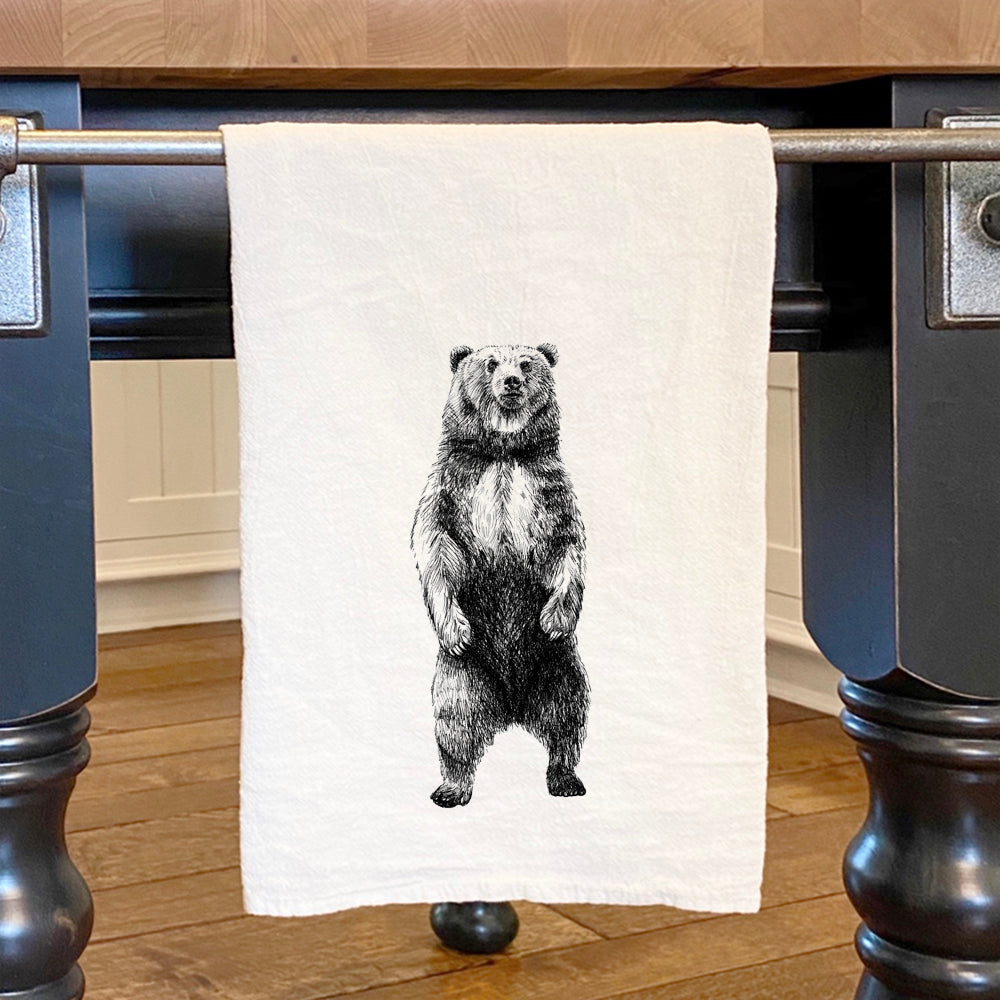 Standing Bear Sketch cotton tea towel featuring vibrant colors and hemmed edges, perfect for kitchen use.