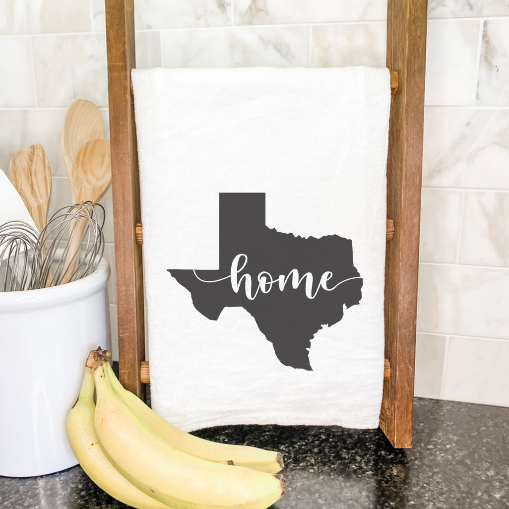 A vibrant cotton tea towel featuring state-themed designs, perfect for kitchen use.