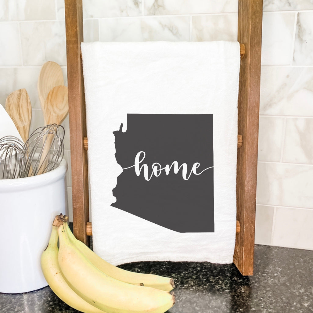 A vibrant cotton tea towel featuring state-themed designs, perfect for kitchen use.