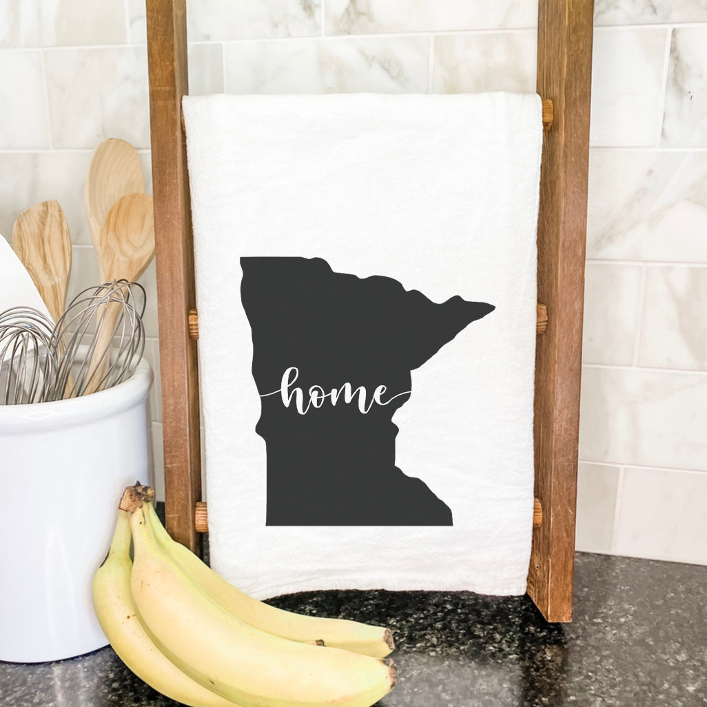 A vibrant cotton tea towel featuring state-themed designs, perfect for kitchen use.