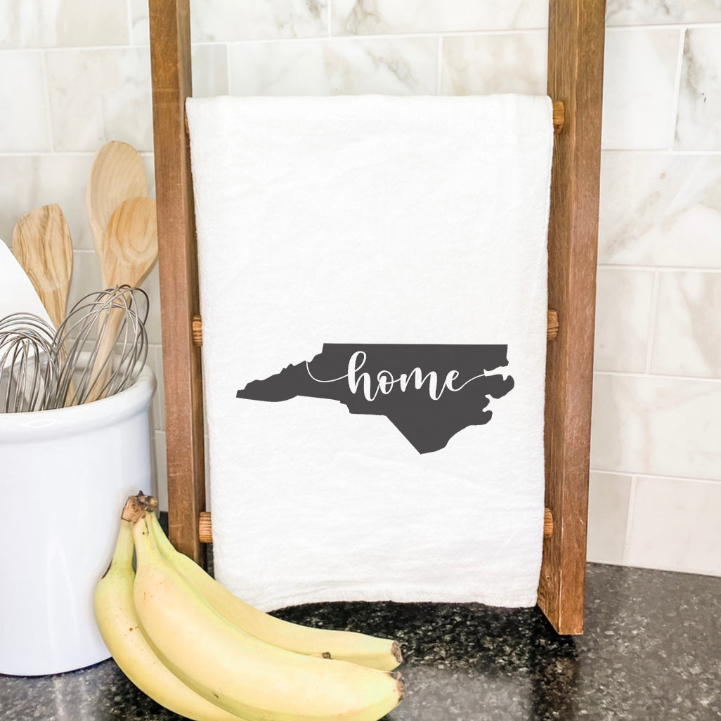 A vibrant cotton tea towel featuring state-themed designs, perfect for kitchen use.